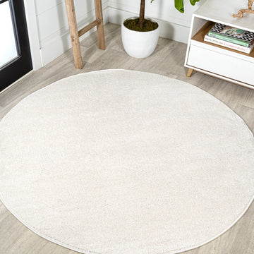 Haze Solid Low-pile Area Rug Cream